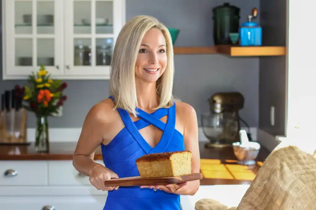 Beautiful woman holding a keto breads.